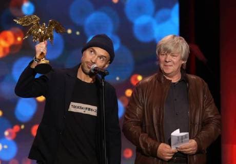 MOSCOW REGION, RUSSIA â€“ APRIL 1, 2018: Directors of photography Ivan Burlakov (L) and Sergei Astakhov accept an award for Salyut-7 drama film at the 31st Nika Film Award Ceremony, at the Vegas City Hall. Vyacheslav Prokofyev TASS  TS07A32A
