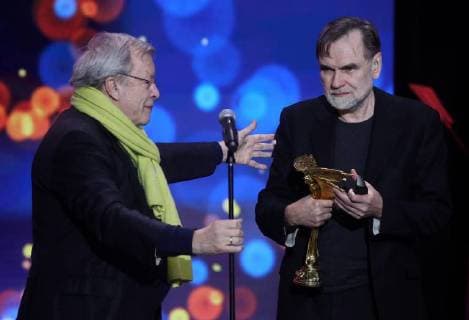 MOSCOW REGION, RUSSIA â€“ APRIL 1, 2018: Writer Viktor Yerofeyev (L) looks on as producer Sergei Selyanov accepts the Best Screenplay award on behalf of screenwriters Natalya Meshchaninova and Boris Khlebnikov for the film Arrhythmia at the 31st Nika Film Award Ceremony, at the Vegas City Hall. Vyacheslav Prokofyev TASS  TS07A366