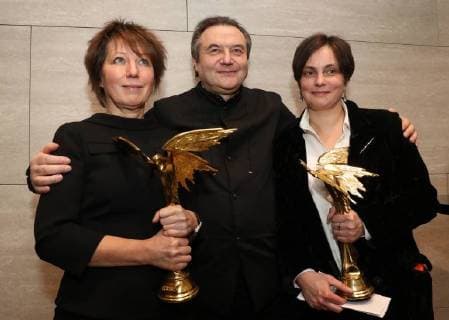 MOSCOW REGION, RUSSIA â€“ APRIL 1, 2018: Film director Alexei Uchitel (C) and costume designers Nadezhda Vasilyeva (L) and Olga Mikhailova (R) holding trophies for the for Best Costume Design for the film Matilda at the 31st Nika Film Award Ceremony, at the Vegas City Hall. Vyacheslav Prokofyev TASS  TS07A372