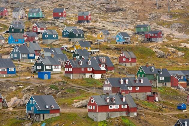 Europe Scandinavia Location City Greenland East Greenland Ammassalik Fjord Island hiking tourists in Tasillaq on Kong Oscar fjord