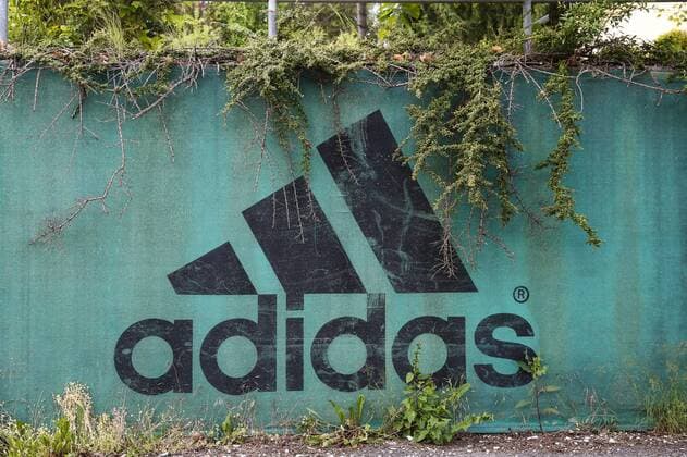 Logo adidas at the parking lot of the former administration building and office complex of the old Adidas headquarters in Herzogenaurach Germany Sport 10 06 2017