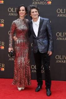 English actress Sally Humphreys and English musician Ronnie Wood attend The Olivier Awards 2018 with Mastercard at Royal Albert Hall in London. APRIL 8th 2018  MESx18970