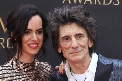 English actress Sally Humphreys and English musician Ronnie Wood attend The Olivier Awards 2018 with Mastercard at Royal Albert Hall in London. APRIL 8th 2018  MESx18970