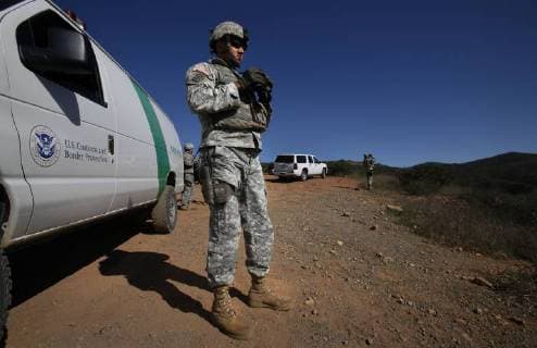 April 11, 2018 - (File Photo) - California Gov. Brown has agreed to send more National Guard troops to the border with Mexico, but said Wednesday they will not be used to support any immigration enforcement or to build a border wall. PICTURED: Dec. 54 2011 - Otay Mountain, CA, USA - Sgt. MARIO VILLA with the National Guard keeps watch over the area between teh U.S.-Mexico border and his hilltop lookout Monday. National Guard troops are expected to draw down in their operation along the border assisting Border Patrol agents in surveillance. For now, however, they are still working around the clock. Otay Mountain U.S. - ZUMAs44_ 20111205_zaf_s44_004 Copyright: xPeggyxPeattiex