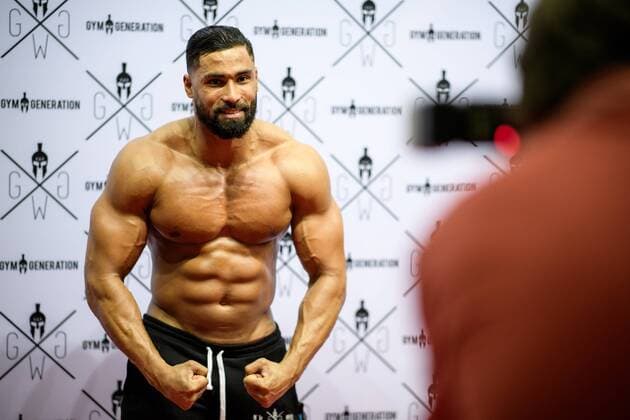 FIBO International Trade Fair for Fitness 12 04 2018 A body picture poses for a camera during FIBO at 12.04.2018 Cologne NRW Germany Messe