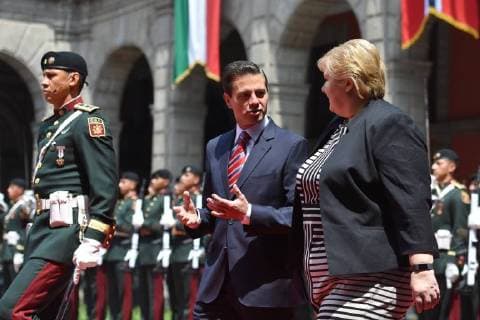 April 12, 2018 - Mexico City, Mexico - Mexican President Enrique Pena Nieto (R) and Norwegian prime Minister Erna Solberg, talk during her welcome ceremony at the National Palace in Mexico City on April 12, 2018. Mexico City Mexico  - ZUMAn230 20180412_zaa_n230_839 Copyright: xCarlosxTischlerx