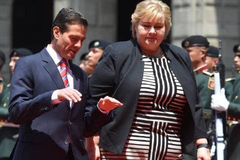April 12, 2018 - Mexico City, Mexico - Mexican President Enrique Pena Nieto (R) and Norwegian prime Minister Erna Solberg, talk during her welcome ceremony at the National Palace in Mexico City on April 12, 2018. Mexico City Mexico  - ZUMAn230 20180412_zaa_n230_843 Copyright: xCarlosxTischlerx