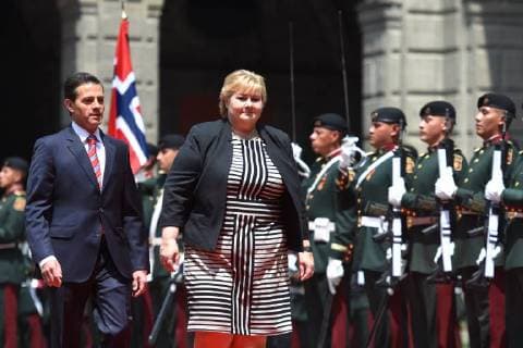 April 12, 2018 - Mexico City, Mexico - Mexican President Enrique Pena Nieto (R) and Norwegian prime Minister Erna Solberg, talk during her welcome ceremony at the National Palace in Mexico City on April 12, 2018. Mexico City Mexico  - ZUMAn230 20180412_zaa_n230_845 Copyright: xCarlosxTischlerx