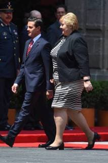 April 12, 2018 - Mexico City, Mexico - Mexican President Enrique Pena Nieto (R) and Norwegian prime Minister Erna Solberg, talk during her welcome ceremony at the National Palace in Mexico City on April 12, 2018. Mexico City Mexico  - ZUMAn230 20180412_zaa_n230_853 Copyright: xCarlosxTischlerx