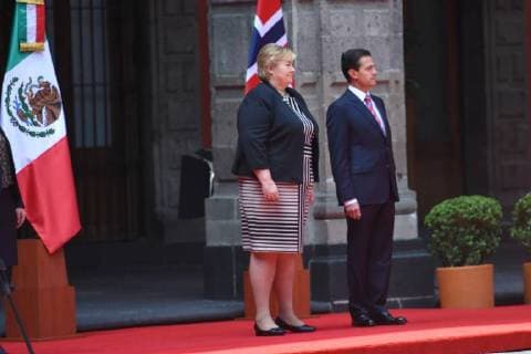 April 12, 2018 - Mexico City, Mexico - Mexican President Enrique Pena Nieto (R) and Norwegian prime Minister Erna Solberg, talk during her welcome ceremony at the National Palace in Mexico City on April 12, 2018. Mexico City Mexico  - ZUMAn230 20180412_zaa_n230_854 Copyright: xCarlosxTischlerx