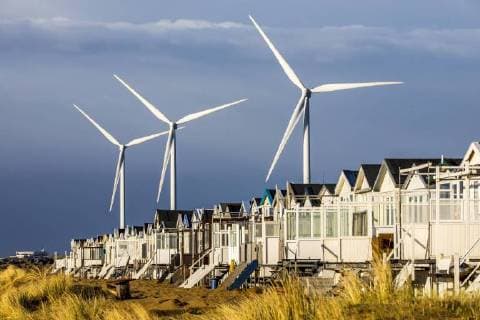 Windmills Wind Farm Holiday Houses beach houses on the beach of Ijmuiden in North Holland Netherlands