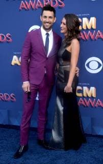 Singer Jake Owen (L) and Erica Hartlein attend the 53rd annual Academy of Country Music Awards held at MGM Grand Garden Arena in Las Vegas, Nevada on April 15, 2018. The show will be telecast live on CBS.  LAV20180415342 JIMxRUYMEN