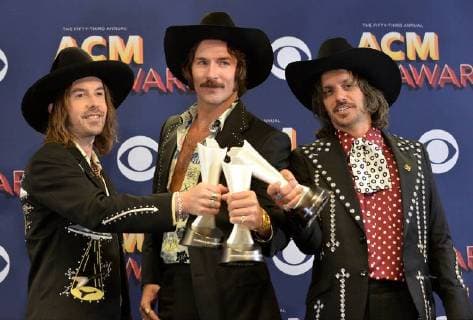 (L-R) Jess Carson, Mark Wystrach, and Cameron Duddy of musical group Midland, winner of the award for New Vocal Duo or Group of the Year, appears backstage at the 53rd annual Academy of Country Music Awards held at MGM Grand Garden Arena in Las Vegas, Nevada on April 15, 2018. The show will be telecast live on CBS.  LAV20180415418 JIMxRUYMEN