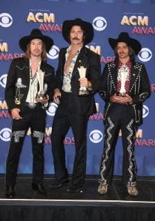 April 15, 2018 - Las Vegas, NV, U.S. - 15 April 2018 - Las Vegas, Nevada - Midland. 2018 ACM Awards Photo Room at Grand Garden Arena. Photo Credit: MJT AdMedia Las Vegas U.S. - ZUMAa123 20180415_zaa_a123_107 Copyright: xMjtAdmediax
