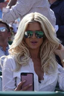 Swedish fashion model Victoria Silvstedt in a box at Court Rainier III in the Monte Carlo Country Club at the Rolex Monte Carlo Masters 1000 ATP World Tour tennis tournament