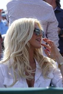 Swedish fashion model Victoria Silvstedt in a box at Court Rainier III in the Monte Carlo Country Club at the Rolex Monte Carlo Masters 1000 ATP World Tour tennis tournament