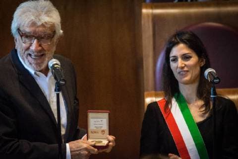 April 21, 2018 - Rome, Lazio, Italy - the Mayor of Rome Virginia Raggi with Gigi Proietti during the celebration ceremony for the 2771st Christmas in Rome. The celebrations were launched by the Mayor of Rome Virginia Raggi and the President of the Capitoline Assembly Marcello De Vito. Also present were the Deputy Mayor with responsibility for Cultural Growth, Luca Bergamo, the Councillor for Person, School and Community Solidarity, Laura Baldassarre, .The Mayor Virginia Raggi awarded Gigi Proietti the Premio Cultori di Roma 2018 , promoted by the Istituto nazionale di Studi Romani and intended for personalities who have distinguished themselves in their studies and works on Rome.on April 21, 2018 in Rome, Italy Rome Italy - ZUMAn230 20180421_zaa_n230_676 Copyright: xAndreaxRonchinix