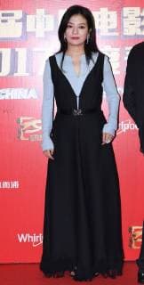 Chinese director and actress Zhao Wei poses as she arrives on the red carpet for 9th China Film Directors Guild Award in Beijing, China, 21 April 2018. Zhao Wei, Zhou Xun dress up for 9th China Film Directors Guild Award in Beijing  pbu789357_10