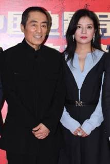 Chinese director Zhang Yimou, left, and director and actress Zhao Wei pose as they arrive on the red carpet for 9th China Film Directors Guild Award in Beijing, China, 21 April 2018. Zhao Wei, Zhou Xun dress up for 9th China Film Directors Guild Award in Beijing  pbu789357_16