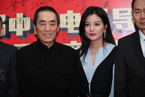 Chinese director Zhang Yimou, left, and director and actress Zhao Wei pose as they arrive on the red carpet for 9th China Film Directors Guild Award in Beijing, China, 21 April 2018. Zhao Wei, Zhou Xun dress up for 9th China Film Directors Guild Award in Beijing  pbu789338_06