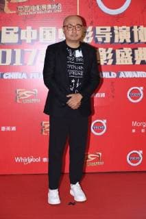 Chinese actor and director Xu Zheng poses as he arrives on the red carpet for 9th China Film Directors Guild Award in Beijing, China, 21 April 2018. Zhao Wei, Zhou Xun dress up for 9th China Film Directors Guild Award in Beijing  pbu789351_34
