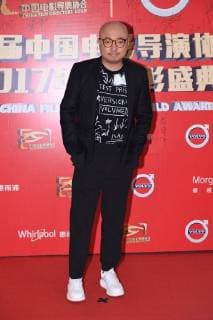Chinese actor and director Xu Zheng poses as he arrives on the red carpet for 9th China Film Directors Guild Award in Beijing, China, 21 April 2018. Zhao Wei, Zhou Xun dress up for 9th China Film Directors Guild Award in Beijing  pbu789351_35