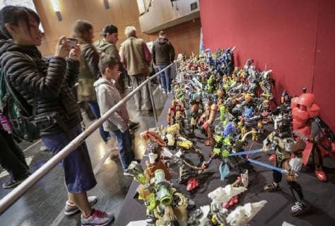 (180421) -- VANCOUVER, April 21, 2018 -- People view LEGO creations at the BrickCan LEGO convention in Vancouver, Canada, April 21, 2018. About 200 LEGO builders across the world showcased more than 6,000 pieces of creations at the annual BrickCan event which is claimed to be Canada s largest public LEGO fan convention. ) CANADA-VANCOUVER-LEGO-EXHIBITION LiangxSen 