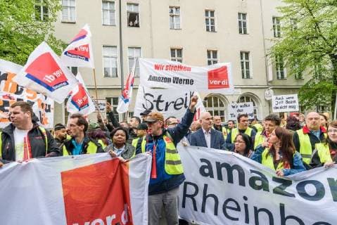 Protest against the presentation of the Axel Springer Award On 24 April 2018, hundreds of employees and sympathizers demonstrated in Berlin against the awarding of the Axel Springer Award to Amazon boss Jeff Bezos. In the afternoon, several hundred participants gathered at Oranienplatz in Kreuzberg to visit nearby Axel Springer skyscraper to pull Berlin Berlin Germany Kreuzberg Mitte