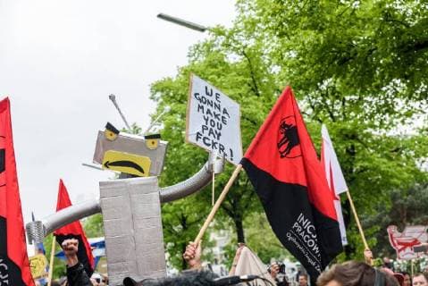 Protest against the presentation of the Axel Springer Award On 24 April 2018, hundreds of employees and sympathizers demonstrated in Berlin against the awarding of the Axel Springer Award to Amazon boss Jeff Bezos. In the afternoon, several hundred participants gathered at Oranienplatz in Kreuzberg to visit nearby Axel Springer skyscraper to pull Berlin Berlin Germany Kreuzberg Mitte