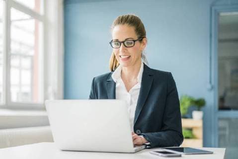Businesswoman using laptop at home model released Symbolfoto property released  MOEF00917