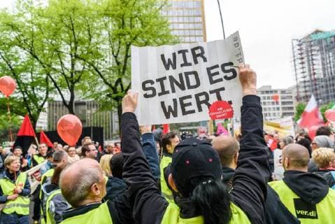 Protest against the presentation of the Axel Springer Award On 24 April 2018, hundreds of employees and sympathizers demonstrated in Berlin against the awarding of the Axel Springer Award to Amazon boss Jeff Bezos. In the afternoon, several hundred participants gathered at Oranienplatz in Kreuzberg to visit nearby Axel Springer skyscraper to pull Berlin Berlin Germany Kreuzberg Mitte