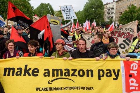 Amazon employees protesting against the awarding of the Axel Springer Award to Amazon boss Jeff Bezos in front of the Axel Springer publishing house in Berlin snapshot photography F Boillot