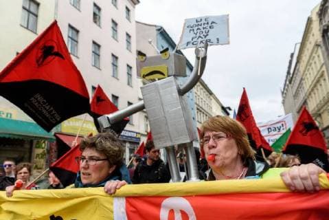 Amazon employees protesting against the awarding of the Axel Springer Award to Amazon boss Jeff Bezos in front of the Axel Springer publishing house in Berlin snapshot photography F Boillot
