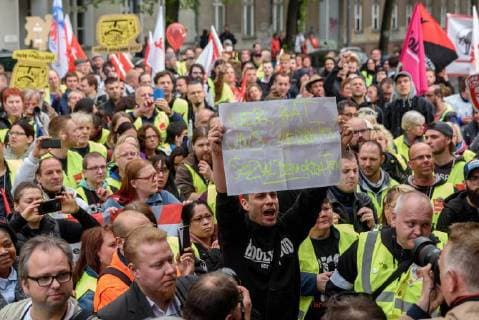 Amazon employees protesting against the awarding of the Axel Springer Award to Amazon boss Jeff Bezos in front of the Axel Springer publishing house in Berlin snapshot photography F Boillot