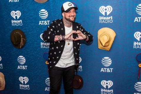 May 5, 2018 - Austin, Texas, USA - Derrick Tribbett, aka DJ Sinister, walks the Red Carpet at the iHeart Country Music Fest in Austin, Texas on May 5th, 2018 (05 05 18). Photo of DJ SINISTER. Austin USA - ZUMAm222 20180505_zap_m222_019 Copyright: xMichaelxMullenixx