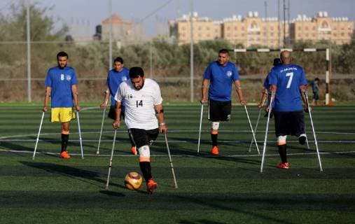 May 7, 2018 - Deir Al-Balah, Gaza Strip, Palestinian Territory - Disabled Palestinians who were lost their limbs during the Israeli wars on Gaza Strip participate in football training, in Deir al-Balah in the center of Gaza Strip on May 7, 2018 Deir Al-Balah Palestinian Territory - ZUMAap3_ 20180507_zaf_ap3_093 Copyright: xAshrafxAmrax