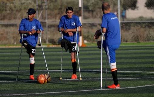 May 7, 2018 - Deir Al-Balah, Gaza Strip, Palestinian Territory - Disabled Palestinians who were lost their limbs during the Israeli wars on Gaza Strip participate in football training, in Deir al-Balah in the center of Gaza Strip on May 7, 2018 Deir Al-Balah Palestinian Territory - ZUMAap3_ 20180507_zaf_ap3_108 Copyright: xAshrafxAmrax