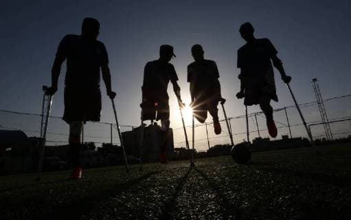 May 7, 2018 - Deir Al-Balah, Gaza Strip, Palestinian Territory - Disabled Palestinians who were lost their limbs during the Israeli wars on Gaza Strip participate in football training, in Deir al-Balah in the center of Gaza Strip on May 7, 2018 Deir Al-Balah Palestinian Territory - ZUMAap3_ 20180507_zaf_ap3_110 Copyright: xAshrafxAmrax