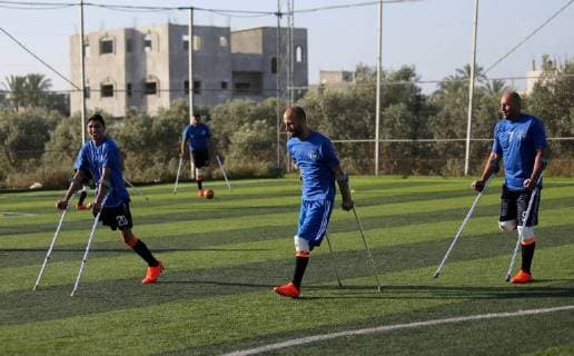 May 7, 2018 - Deir Al-Balah, Gaza Strip, Palestinian Territory - Disabled Palestinians who were lost their limbs during the Israeli wars on Gaza Strip participate in football training, in Deir al-Balah in the center of Gaza Strip on May 7, 2018 Deir Al-Balah Palestinian Territory - ZUMAap3_ 20180507_zaf_ap3_116 Copyright: xAshrafxAmrax