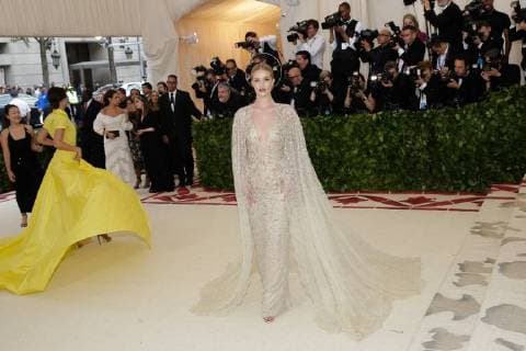 Rosie Huntington-Whiteley arrives on the red carpet at The Metropolitan Museum of Art s Costume Institute Benefit Heavenly Bodies: Fashion and the Catholic Imagination at Metropolitan Museum of Art in New York City on May 7, 2018.  NYP20180507354 JOHNxANGELILLO