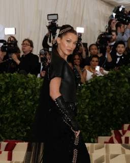 Bella Hadid arrives on the red carpet at The Metropolitan Museum of Art s Costume Institute Benefit Heavenly Bodies: Fashion and the Catholic Imagination at Metropolitan Museum of Art in New York City on May 7, 2018.  NYP20180507302 JOHNxANGELILLO