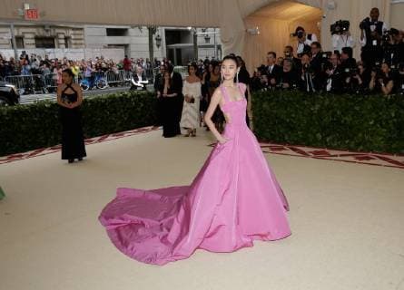 Xi Mengyao arrives on the red carpet at The Metropolitan Museum of Art s Costume Institute Benefit Heavenly Bodies: Fashion and the Catholic Imagination at Metropolitan Museum of Art in New York City on May 7, 2018.  NYP20180507340 JOHNxANGELILLO