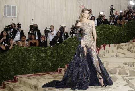Gigi Hadid arrives on the red carpet at The Metropolitan Museum of Art s Costume Institute Benefit Heavenly Bodies: Fashion and the Catholic Imagination at Metropolitan Museum of Art in New York City on May 7, 2018.  NYP20180507744 JOHNxANGELILLO