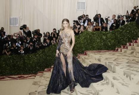Gigi Hadid arrives on the red carpet at The Metropolitan Museum of Art s Costume Institute Benefit Heavenly Bodies: Fashion and the Catholic Imagination at Metropolitan Museum of Art in New York City on May 7, 2018.  NYP20180507746 JOHNxANGELILLO