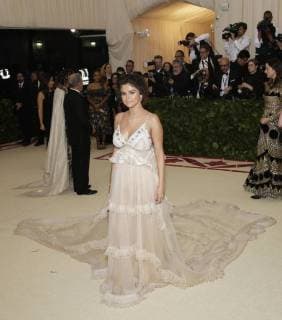 Selena Gomez arrives on the red carpet at The Metropolitan Museum of Art s Costume Institute Benefit Heavenly Bodies: Fashion and the Catholic Imagination at Metropolitan Museum of Art in New York City on May 7, 2018.  NYP20180507751 JOHNxANGELILLO