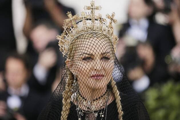 Madonna arrives on the red carpet at The Metropolitan Museum of Art s Costume Institute Benefit Heavenly Bodies: Fashion and the Catholic Imagination at Metropolitan Museum of Art in New York City on May 7, 2018.  NYP20180507793 JOHNxANGELILLO