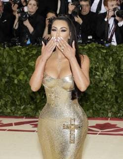 Kimberly Kardashian West arrives on the red carpet at The Metropolitan Museum of Art s Costume Institute Benefit Heavenly Bodies: Fashion and the Catholic Imagination at Metropolitan Museum of Art in New York City on May 7, 2018.  NYP20180507802 JOHNxANGELILLO