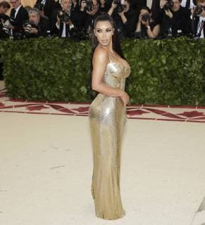 Kimberly Kardashian West arrives on the red carpet at The Metropolitan Museum of Art s Costume Institute Benefit Heavenly Bodies: Fashion and the Catholic Imagination at Metropolitan Museum of Art in New York City on May 7, 2018.  NYP20180507804 JOHNxANGELILLO