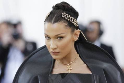 Bella Hadid arrives on the red carpet at The Metropolitan Museum of Art s Costume Institute Benefit Heavenly Bodies: Fashion and the Catholic Imagination at Metropolitan Museum of Art in New York City on May 7, 2018.  NYP20180507829 JOHNxANGELILLO