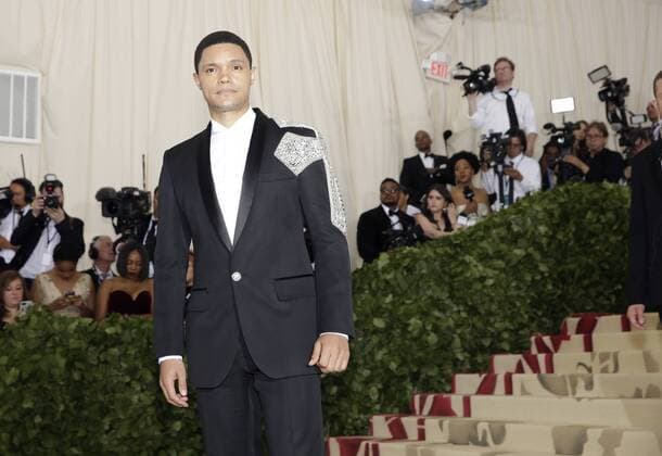 Trevor Noah arrives on the red carpet at The Metropolitan Museum of Art s Costume Institute Benefit Heavenly Bodies: Fashion and the Catholic Imagination at Metropolitan Museum of Art in New York City on May 7, 2018.  NYP20180507754 JOHNxANGELILLO